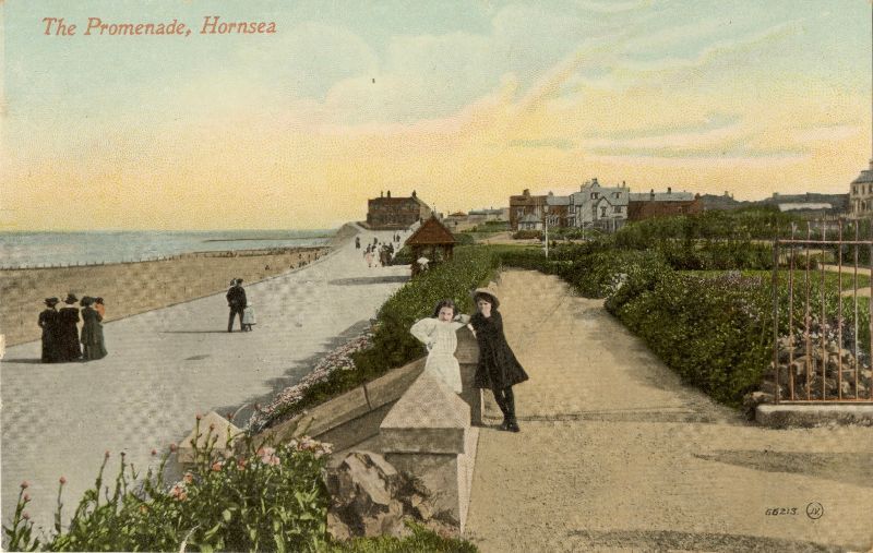 An old painting of people in a sea-side town in the victorian era